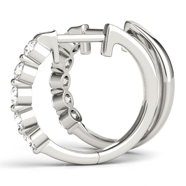 Diamond Shared-Prong Huggie Earrings (1 ct. tw.), Angle view in white gold or platinum
