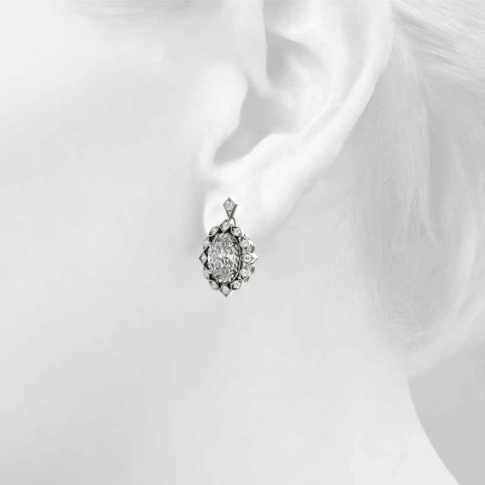 Vintage Inspired Oval Drop Earrings (1/8 ct. tw.), Top view in white gold or platinum