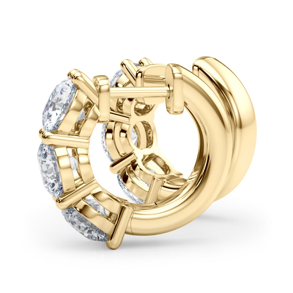 3-Stone Huggies (1.8 ct. tw.), On hand view in yellow gold
