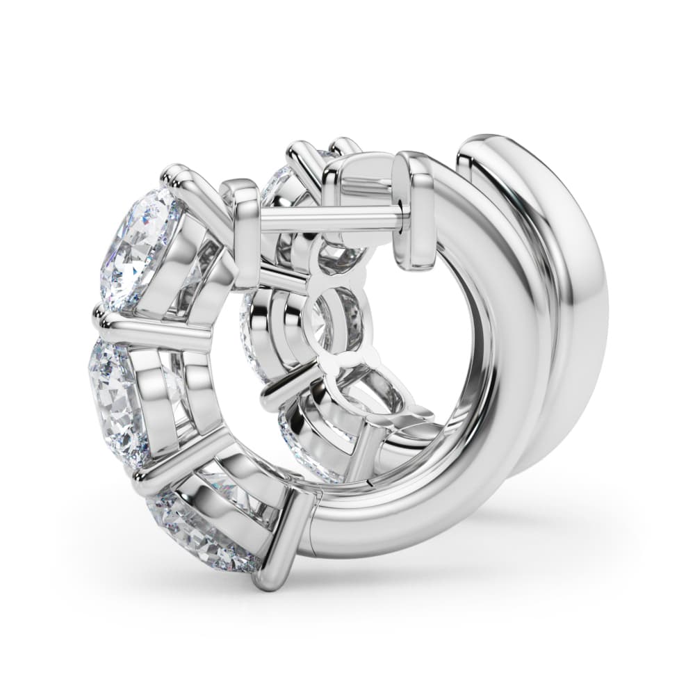 3-Stone Huggies (3 ct. tw.), On hand view in white gold or platinum