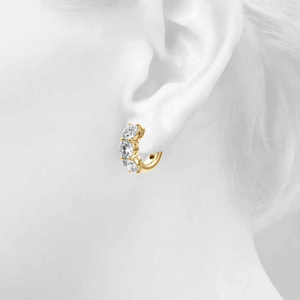 3-Stone Huggies (1.8 ct. tw.), Top view in yellow gold