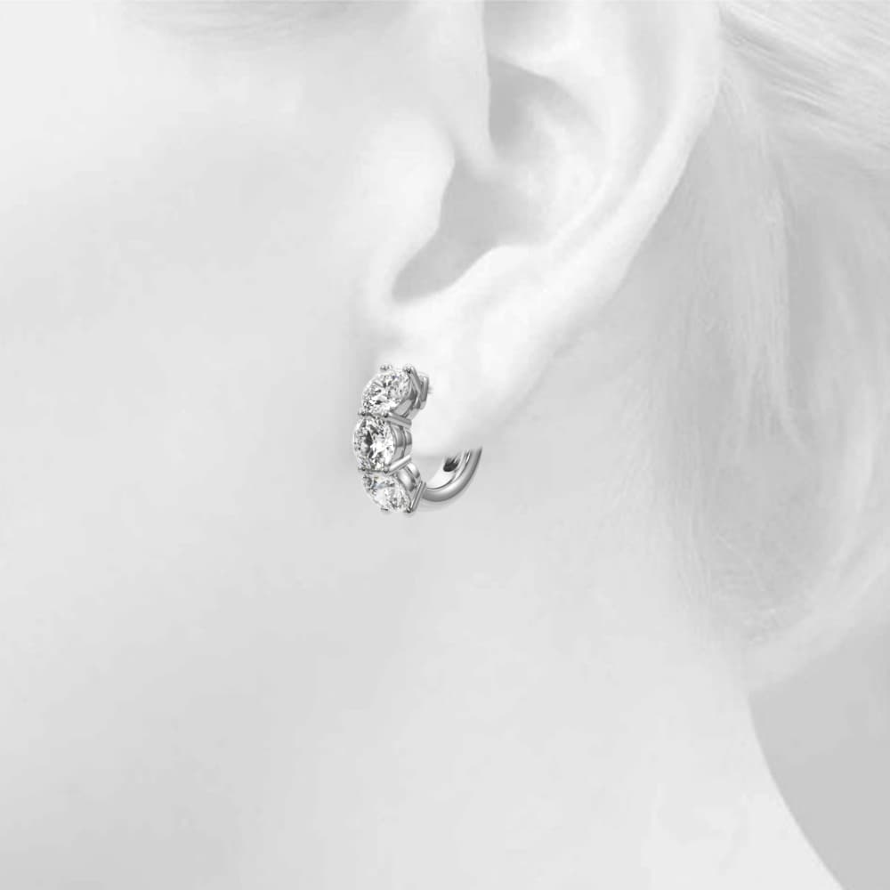 3-Stone Huggies (3 ct. tw.), Top view in white gold or platinum