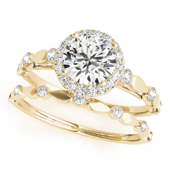 Engagement Rins Halo Round, style 50567, On hand view in yellow gold