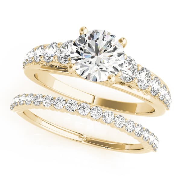 Graduating Trellis Round Engagement Ring, style 50662, On hand view in yellow gold