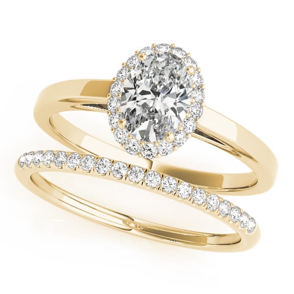 Oval Halo Engagement Ring, style 50916, On hand view in yellow gold