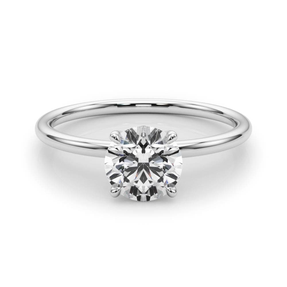 Solitaire Round Engagement Ring, style 85162, On hand view in white gold or platinum