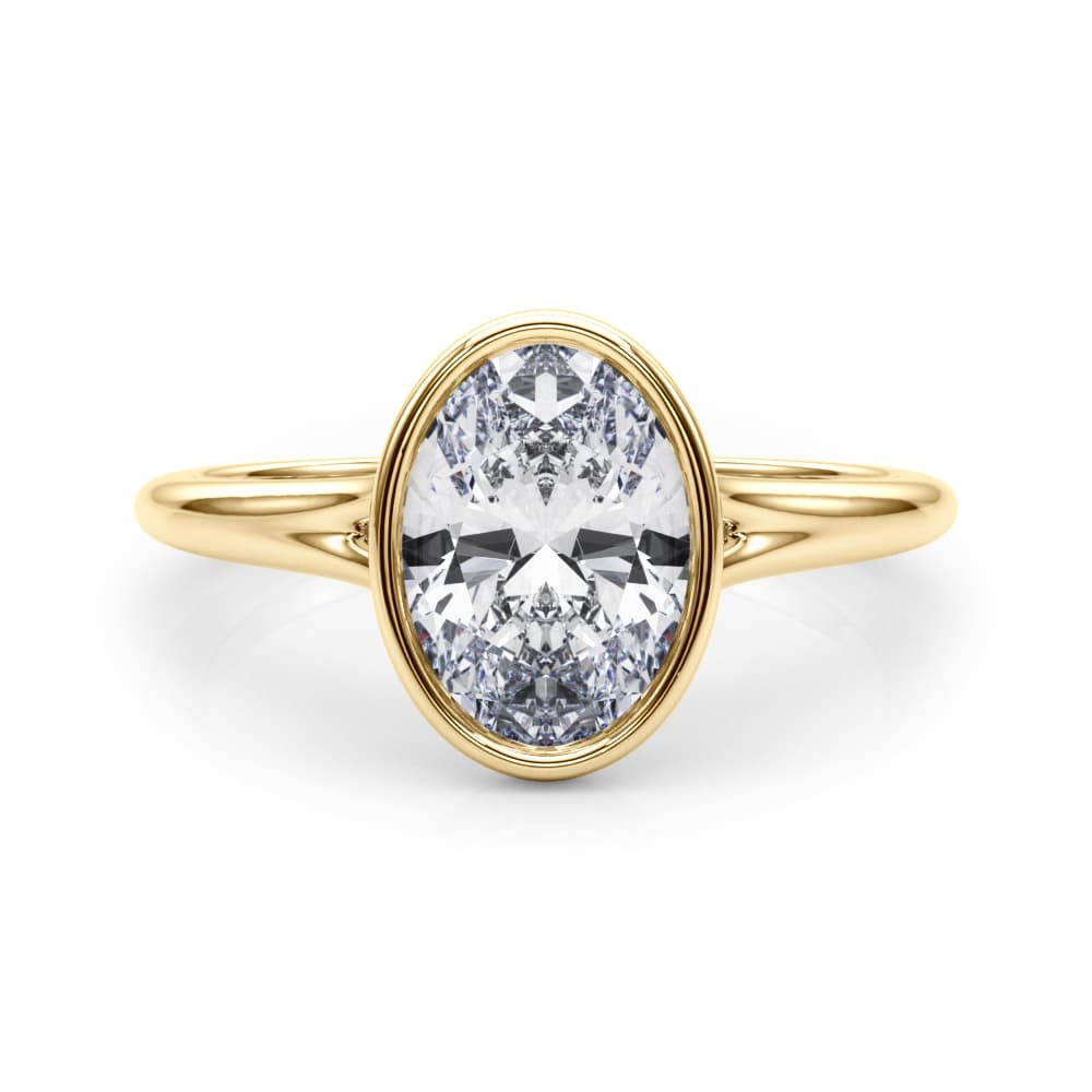 Bezel Set Oval Solitaire Engagement Ring, style 85417, On hand view in yellow gold