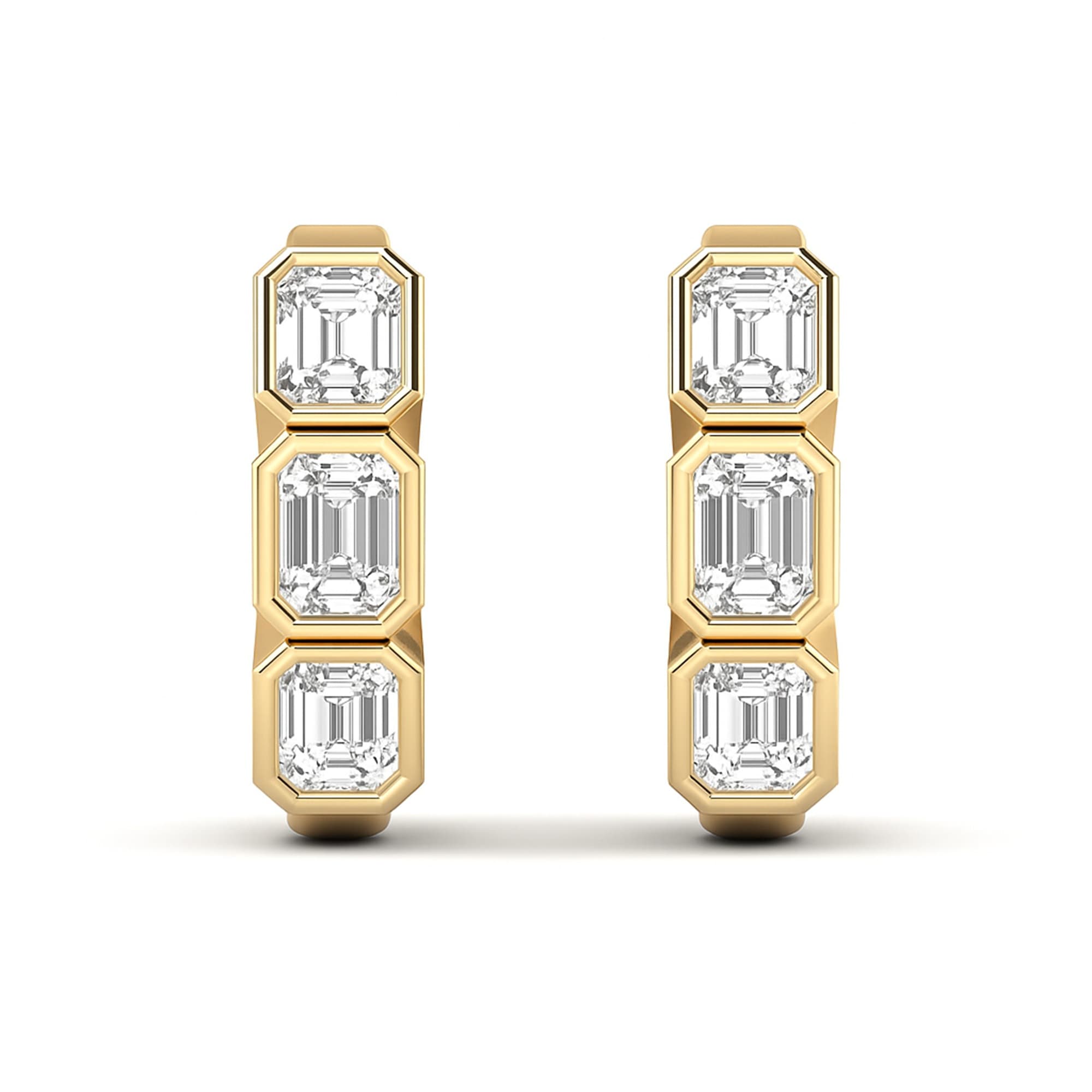 LGD 3-Stone Emerald Cut Hoop Earrings (1 3/4 ct. tw.), On hand view in yellow gold