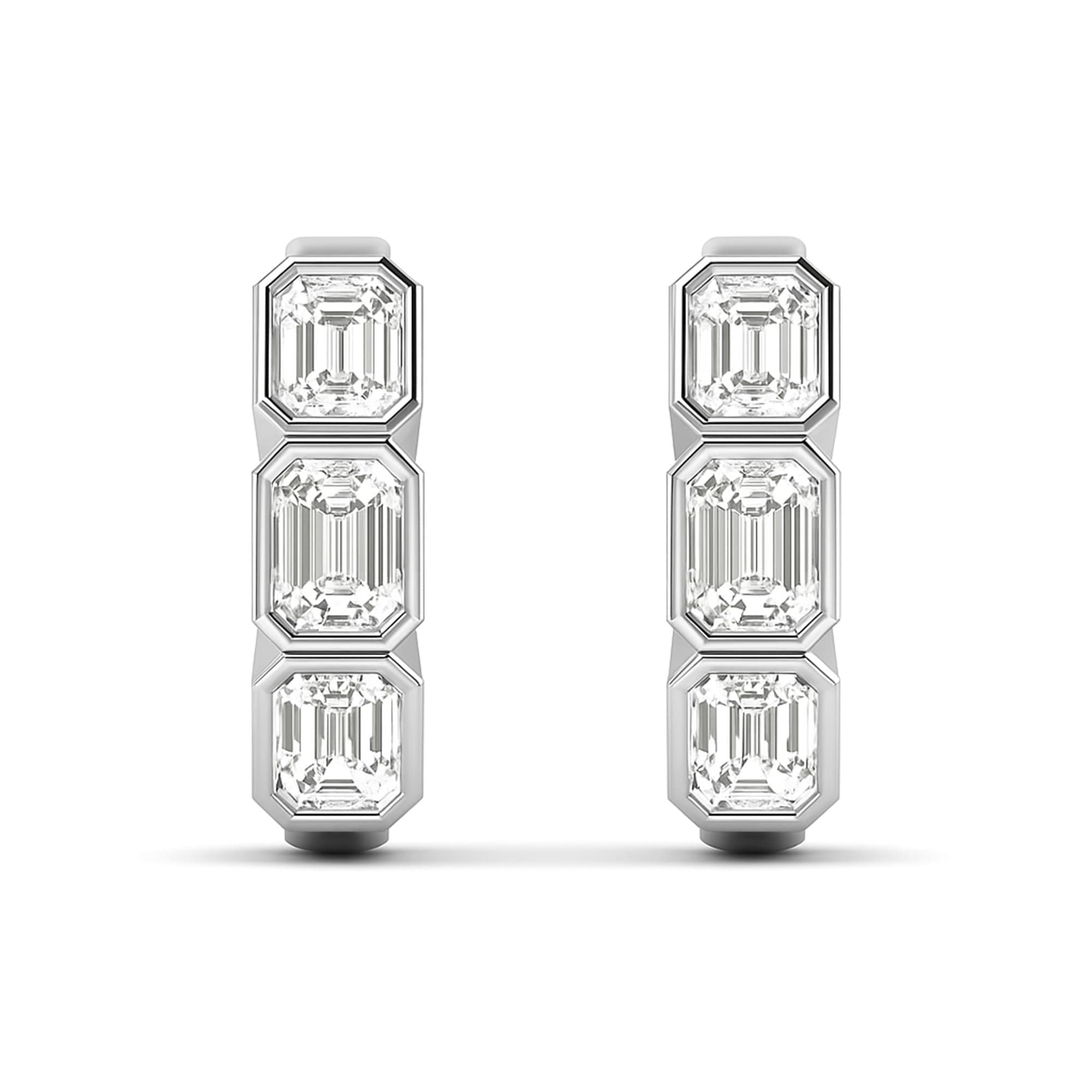LGD 3-Stone Emerald Cut Hoop Earrings (1 3/4 ct. tw.), On hand view in white gold or platinum