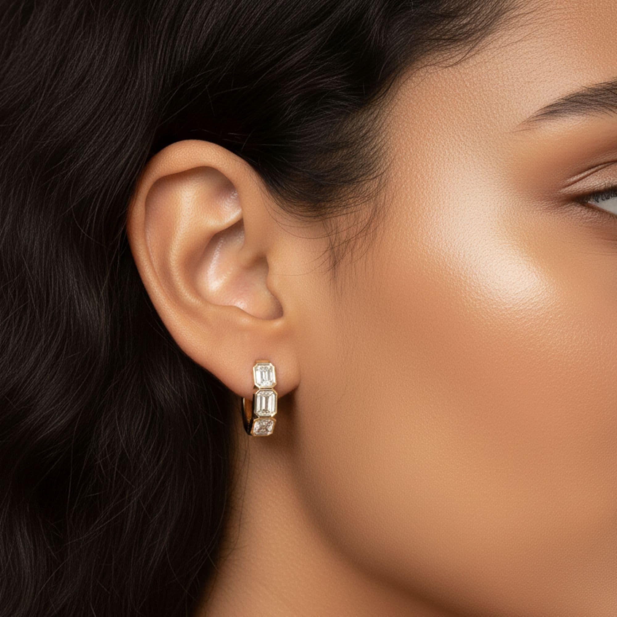 LGD 3-Stone Emerald Cut Hoop Earrings (1 3/4 ct. tw.), Side view in yellow gold