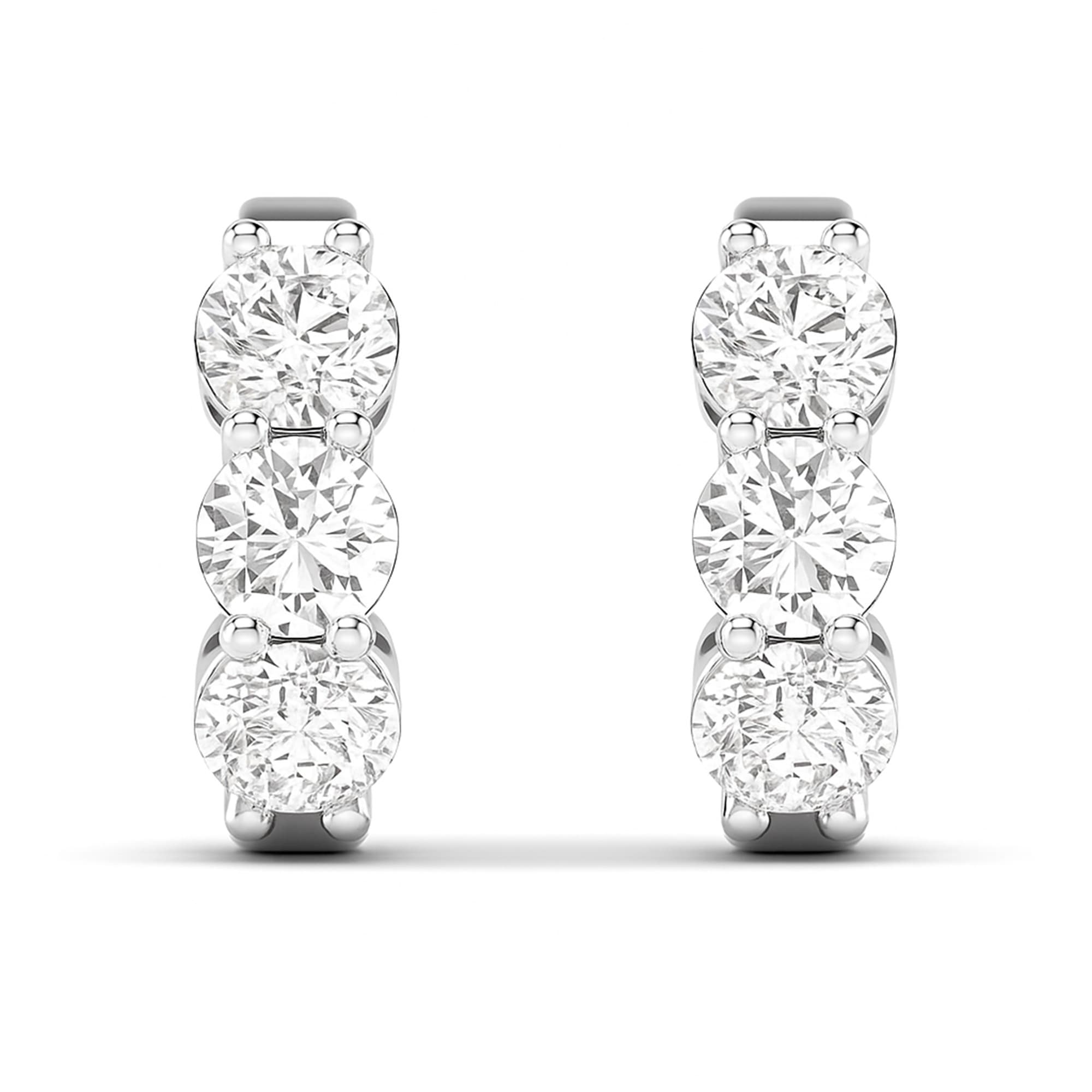 LGD 3-Stone Huggie Earrings (1.9 ct. tw.), On hand view in white gold or platinum