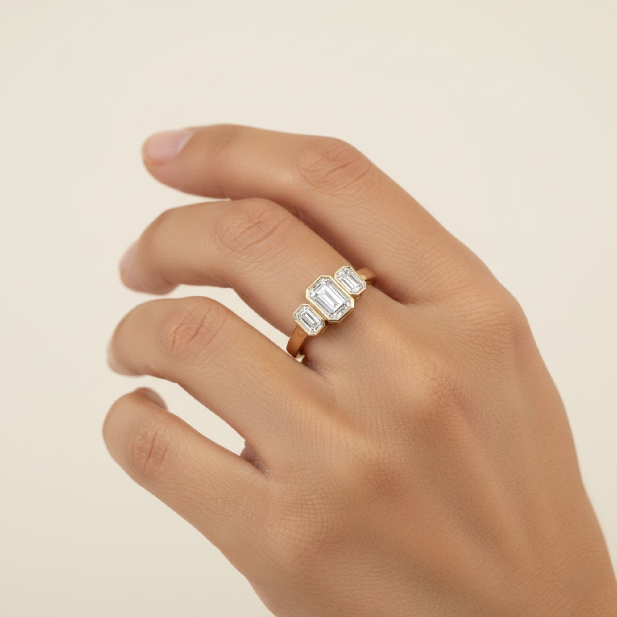 3 Stone Emerald Ring, style L0224R, Front view in yellow gold