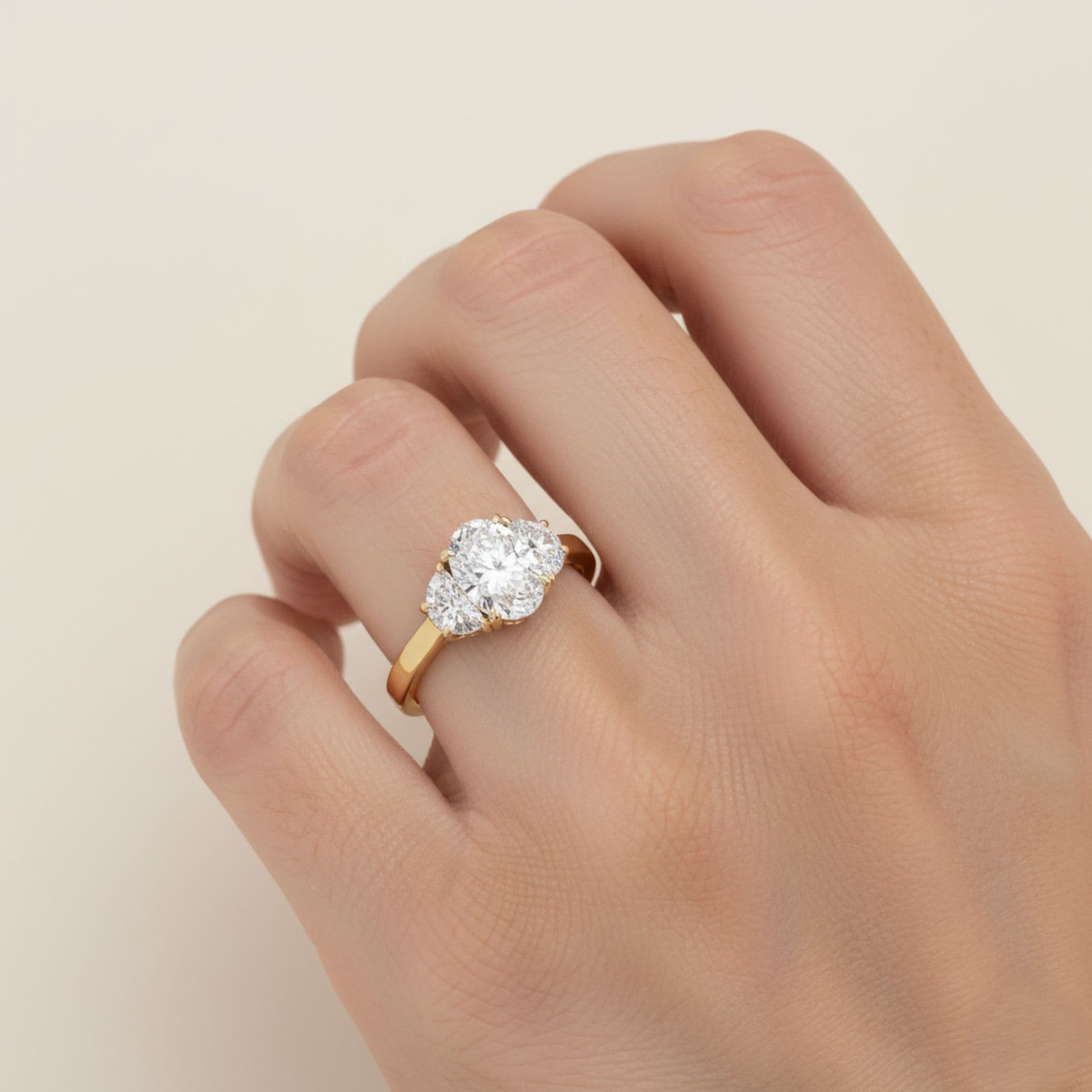 3 Stone Engagement Ring, style L0229R, Side view in yellow gold